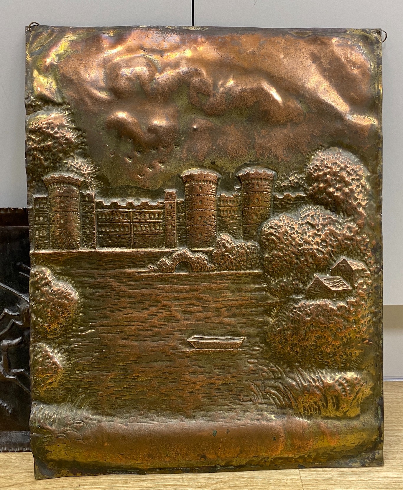 A selection of four copper display panels, to include ‘The GateTower, Herstmonceux’, another similar and two others